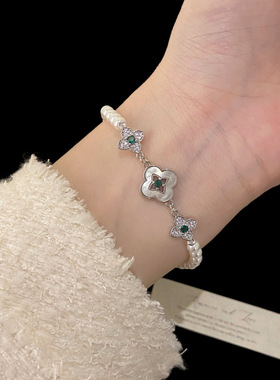 天然贝壳四叶花珍珠手链法式优雅小香风抽拉手串小众气质百搭手饰