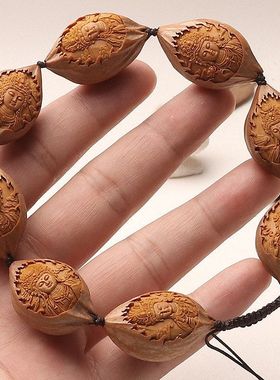 天然橄榄核原皮包衣素核稀有四花核最美观音赐福文玩手串男女盘玩