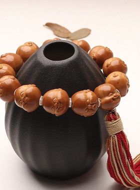 短圆铁核手工雕刻橄榄核三通款十分开心百态手持把件文玩淘气弥勒