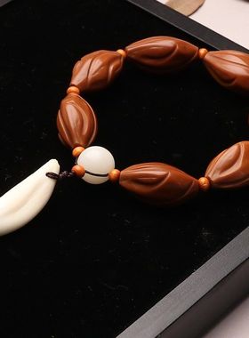 橄榄核雕刻手工打磨设计单圈扭转乾坤素核吊坠黑狗牙文玩男女手串