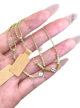 小红书爆款绿色四叶草小蝶蜡线编织手链女时尚显白设计百搭奢品一