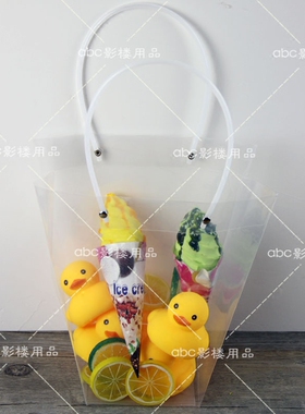 新款旅拍婚纱摄影道具时尚海边外景拍摄道具透明手提袋花盒花袋