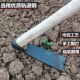 Blacksmith hand hoe agricultural tool loosening soil and plowing the ground