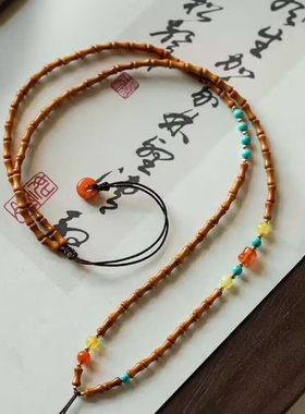 新款新中式橄榄核竹节吊坠绳项链女2024爆款蜜蜡玉髓毛衣链饰品