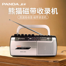 Panda 6500 tape player with body listening to old recording and playback player card with single release retro old style high sound quality