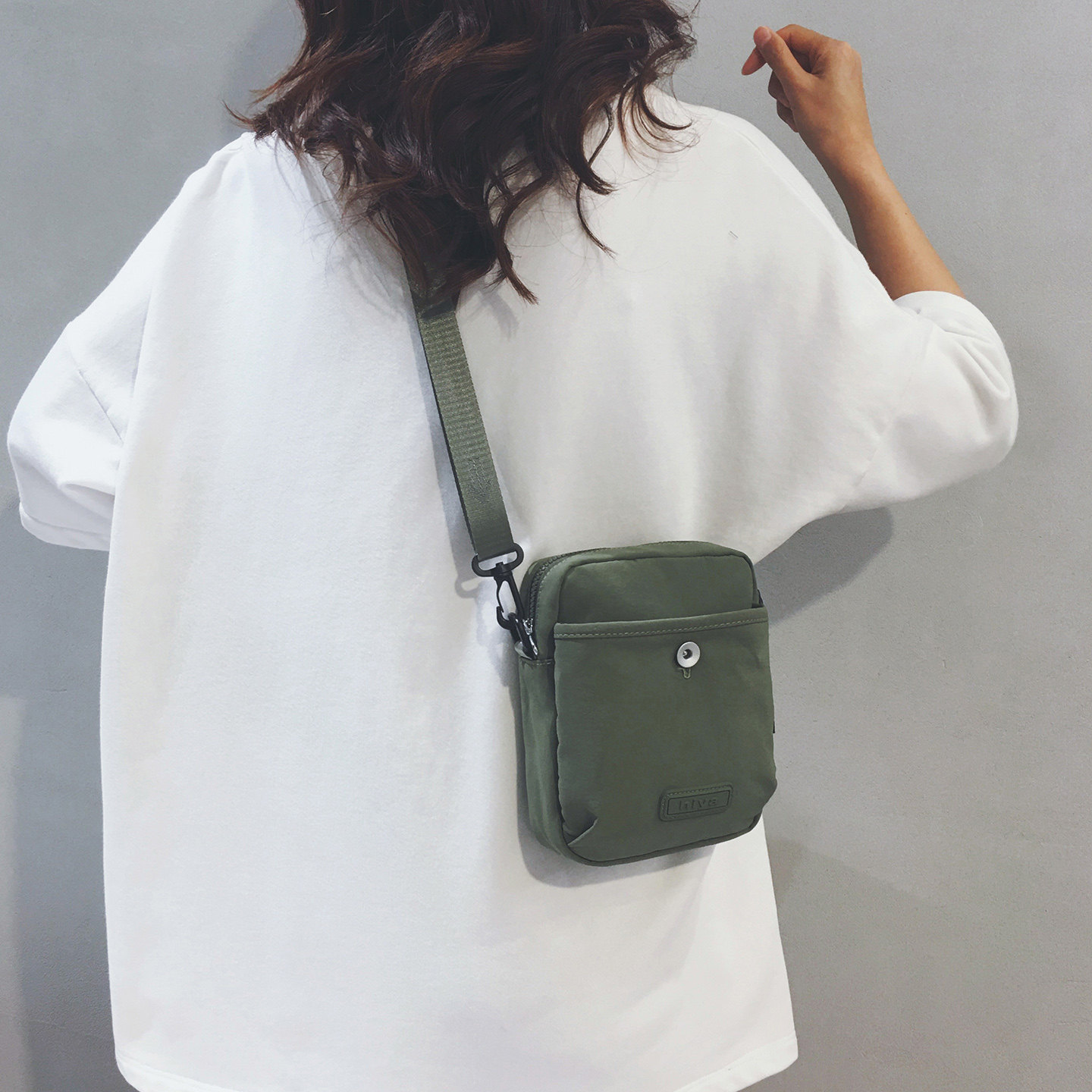 Lightweight small bag women's canvas 2026 new outdoor sports single shoulder small satchel bag casual versatile crossbody mobile phone bag