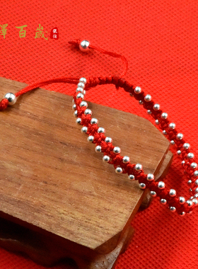 咖啡色绳子编织足银手链