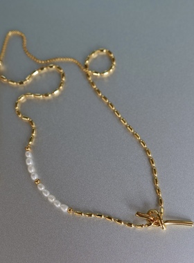 迷人微光。天然淡水珍珠金色米粒橄榄拼接链条绳结吊坠项链时髦