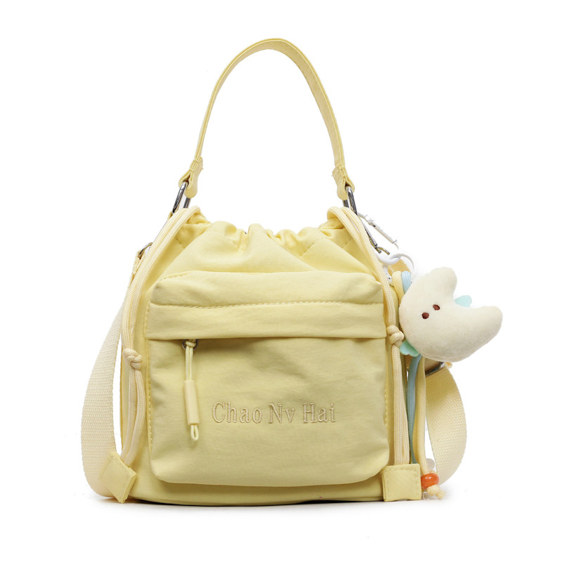 高级感手提小布包女轻便抽绳水桶包 2025新款简约通勤斜挎手机包,淘宝优惠券,粉丝福利购,淘宝优惠卷