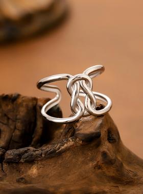 欧美风镂空打结不锈钢金戒