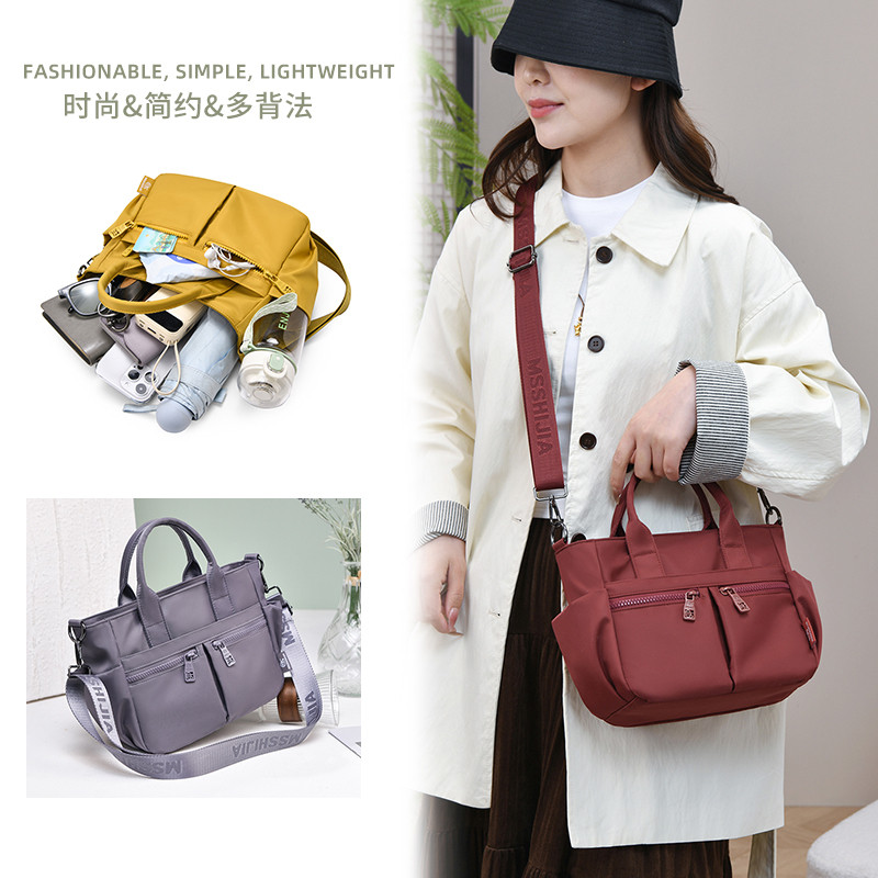 2025新款潮简约多隔层帆布包女大容量手提斜挎通勤托特包轻便实用,淘宝优惠券,粉丝福利购,淘宝优惠卷