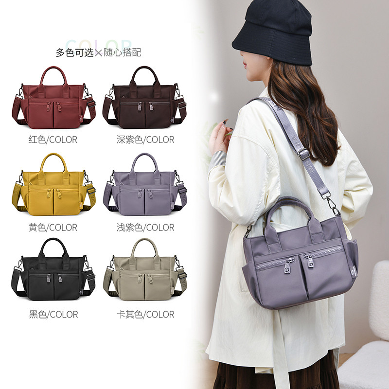 2025新款潮简约多隔层帆布包女大容量手提斜挎通勤托特包轻便实用,淘宝优惠券,粉丝福利购,淘宝优惠卷