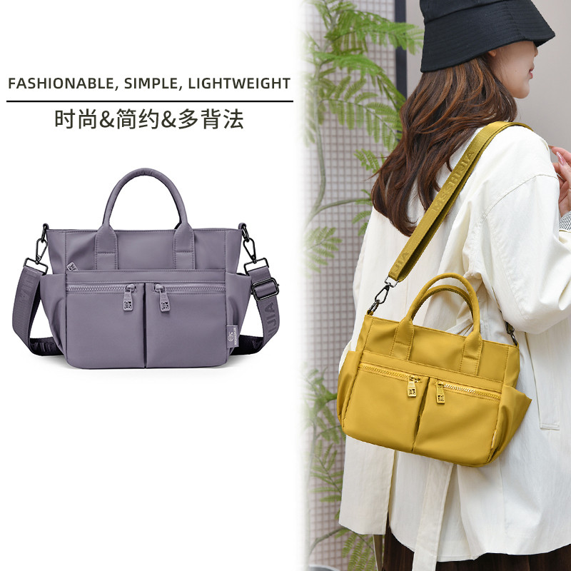 2025新款潮简约多隔层帆布包女大容量手提斜挎通勤托特包轻便实用,淘宝优惠券,粉丝福利购,淘宝优惠卷