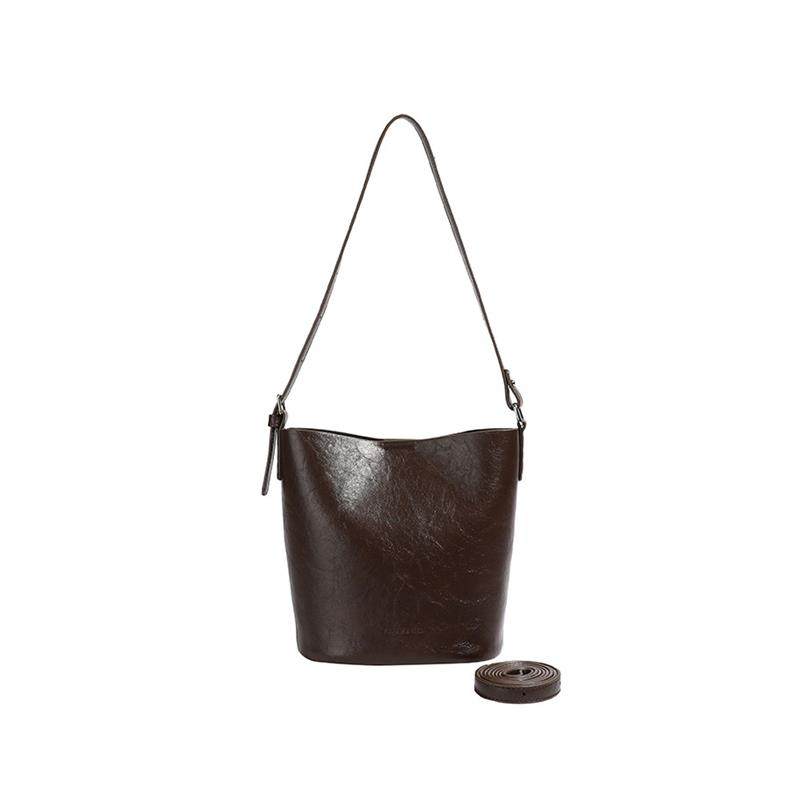 香港品牌真皮包包女2026新款小众复古水桶包高级感百搭单肩斜挎包,淘宝优惠券,粉丝福利购,淘宝优惠卷