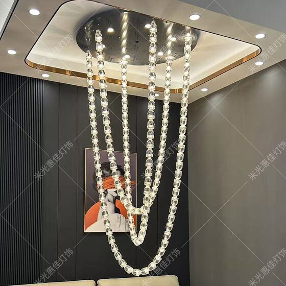 Crystal chandelier in hotel lobby, large chandelier in empty living room