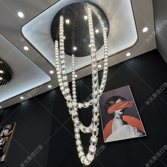 Crystal chandelier in hotel lobby, large chandelier in empty living room