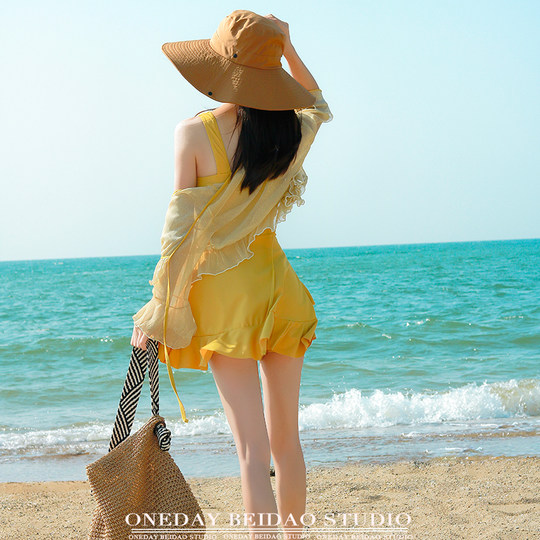 This beauty really knows how to choose a swimsuit that looks white