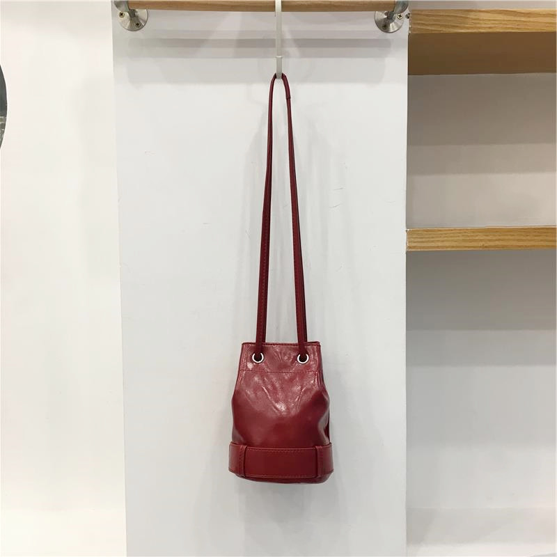 小脏柜 韩国小众抽绳水桶包复古质感休闲百搭简约单肩斜挎女包包,淘宝优惠券,粉丝福利购,淘宝优惠卷