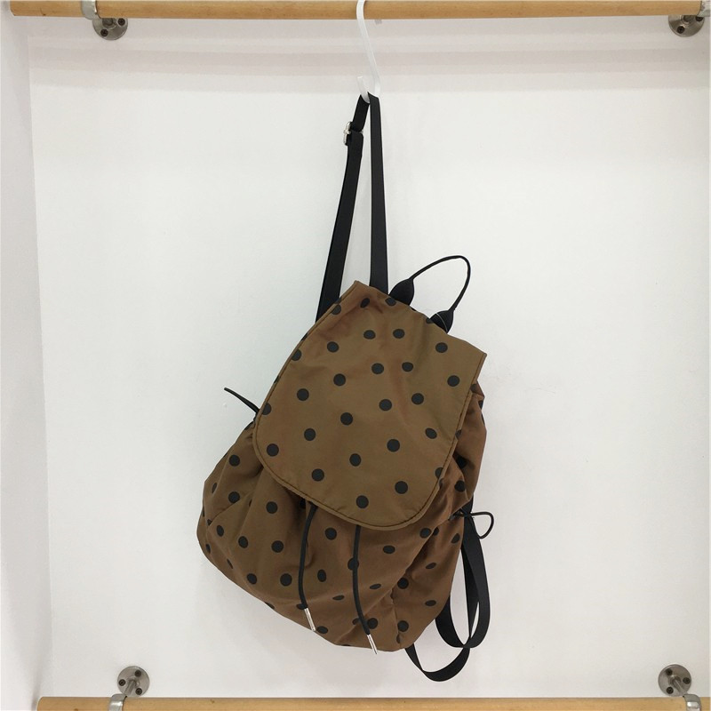 小脏柜 新款波点双肩包时尚轻便小众书包翻盖抽绳流行女包上课包,淘宝优惠券,粉丝福利购,淘宝优惠卷