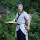 In ancient times, old people and passers-by performed in ancient costumes