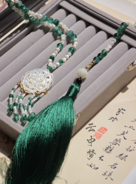 墨绿色璎珞背云蝶贝长流苏珠链