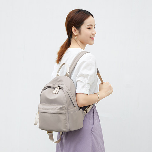 香港品牌防水双肩包包女2026新款大学生简约书包时尚百搭尼龙背包 - 图0
