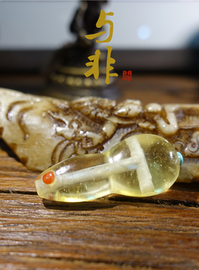 天然琥珀复古镶嵌红宝石佛头