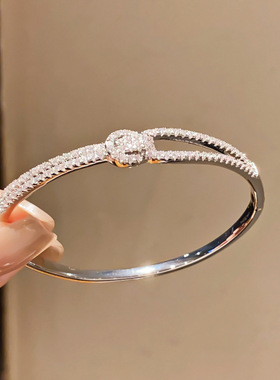 18k真金电镀锆石打结卡扣手镯小众个性独特手环轻奢感手饰女