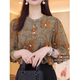 ແມ່ຍິງຄົນອັບເດດ: ຄໍຕະຫຼອດ floral top