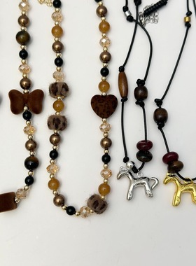 新款豹纹蝴蝶结爱心木马吊坠项链女小众设计感高级轻奢气质毛衣链