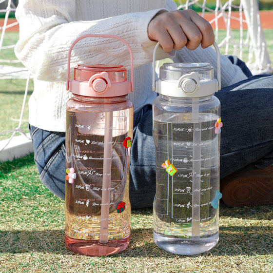 Extra large capacity sports water bottle with handle and graduated water cup