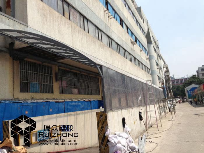 工程实例南京金桥建材市场地下停车库耐力板雨棚通道 - 图1