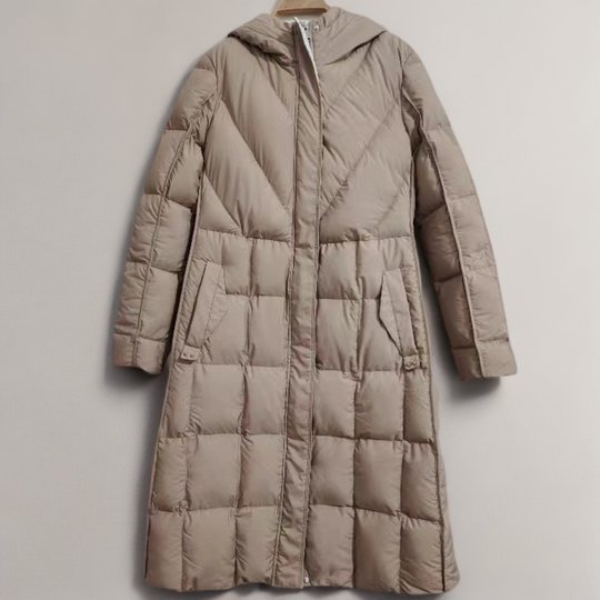 Plumífero sin costuras, despegado, desgomado, reparado y acolchado