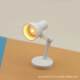 Miniature desk lamp can be used to illuminate the scene props