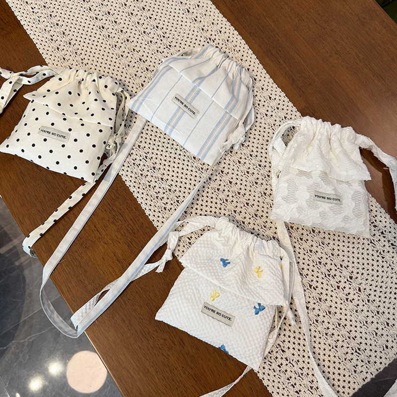 夏季蝴蝶结波点花边木耳斜挎抽绳两用包时尚百搭遛弯包包,淘宝优惠券,粉丝福利购,淘宝优惠卷