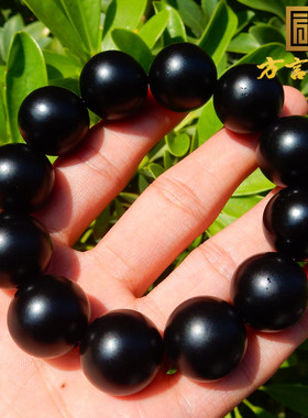 方言新疆墨若纯漆的一细墨玉籽料