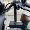 Electric vehicle charger hook thickened to prevent falling