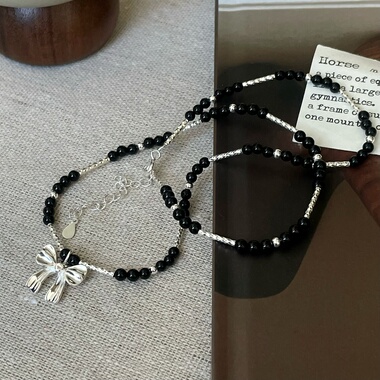 S925纯银蝴蝶结黑色项链精致韩系串珠ins简约高级感小众设计