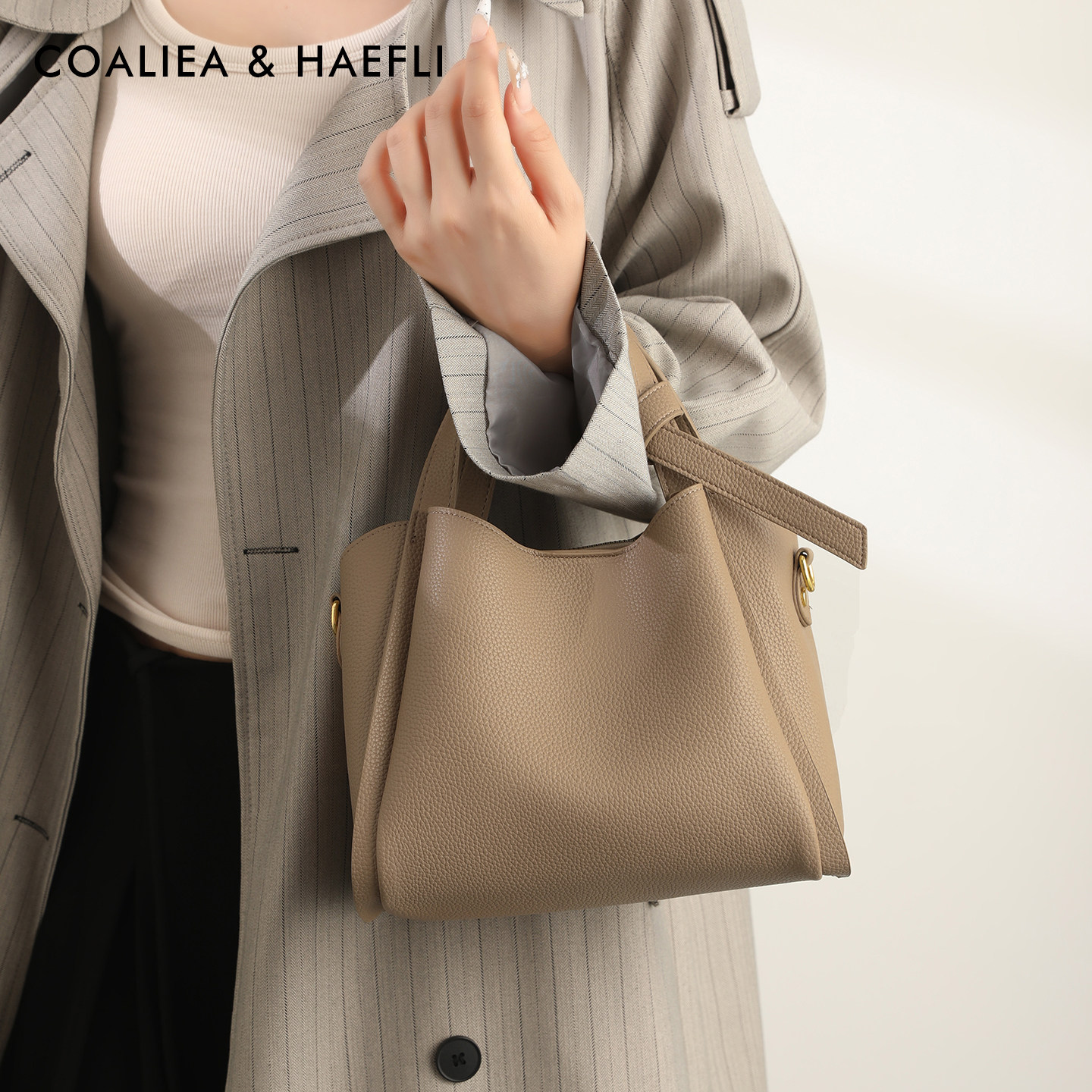 香港品牌水桶包包女2025新款秋斜挎包软皮手提包百搭单肩妈妈女包,淘宝优惠券,粉丝福利购,淘宝优惠卷