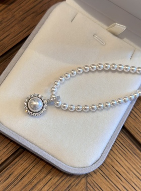 S925纯银镀白金万能搭扣珍珠镶钻太阳花吊坠可搭配珍珠项链