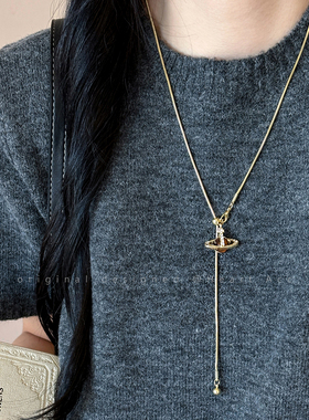 钛钢土星珍珠项链女2025秋冬新款轻奢高级感可抽拉长款毛衣链配饰