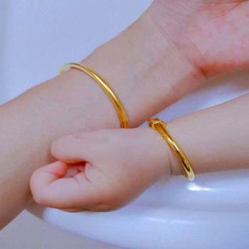 ສາຍແຂນເດັກນ້ອຍ 2024 ໃຫມ່ 18K gold-plated golden bracelet baby bracelet full moon ຂອງຂວັນອາຍຸຫນຶ່ງປີ