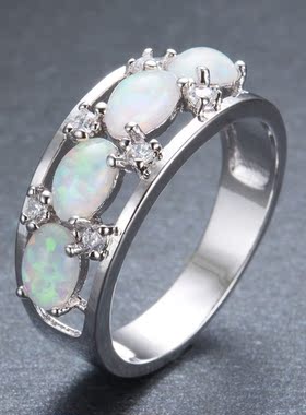 新款跨境时尚通勤四颗椭圆形白色澳宝戒指