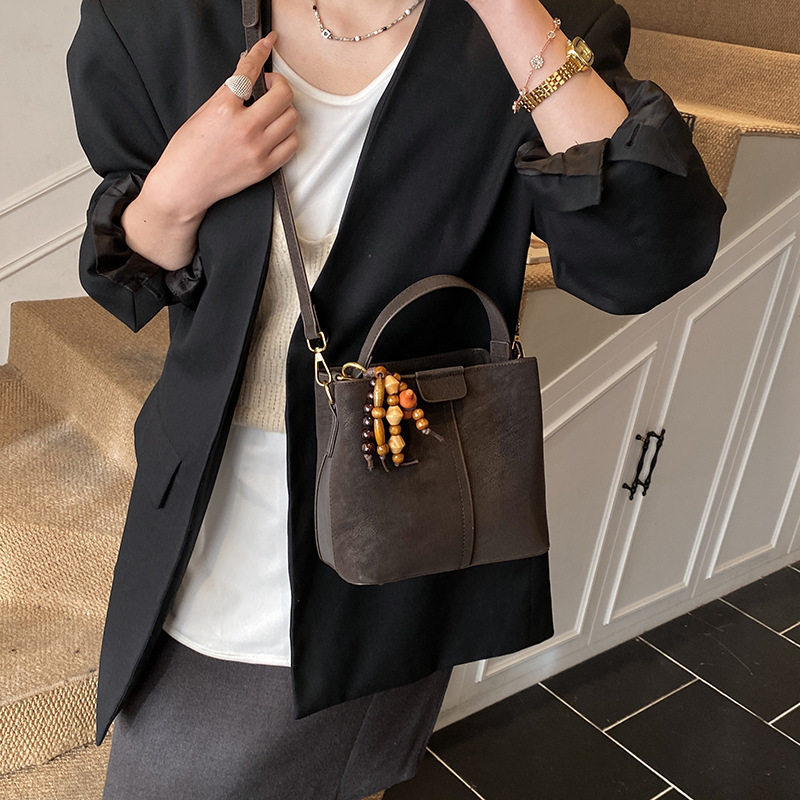 时尚复古小包包女式2025新款潮百搭斜挎包时尚小众单肩手拎水桶包,淘宝优惠券,粉丝福利购,淘宝优惠卷