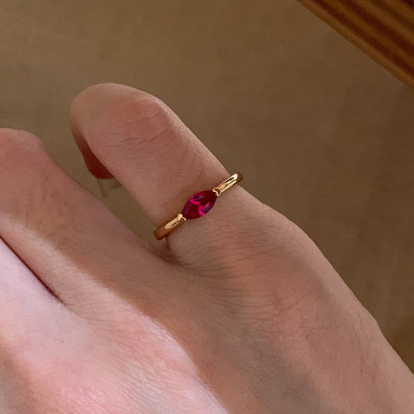 Xiaohongshu’s popular pigeon blood red stone horse eye diamond sterling silver ring for women simple flash diamond versatile little finger tail ring for sale