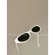 Showing face with little black cat-eye sunglasses sunglasses