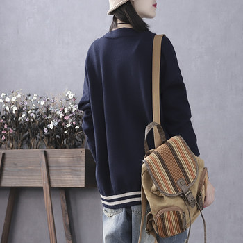 Han Suoyi ວັນນະຄະດີພາກຮຽນ spring ແລະດູໃບໄມ້ລົ່ນຂອງແມ່ຍິງ cardigan sweater knitted sweater coat ເສື້ອຍືດແຂນຍາວຂອງແມ່ຍິງຂະຫນາດໃຫຍ່ທີ່ມີຂະຫນາດໃຫຍ່ວ່າງອອກນອກປົກກະຕິ.