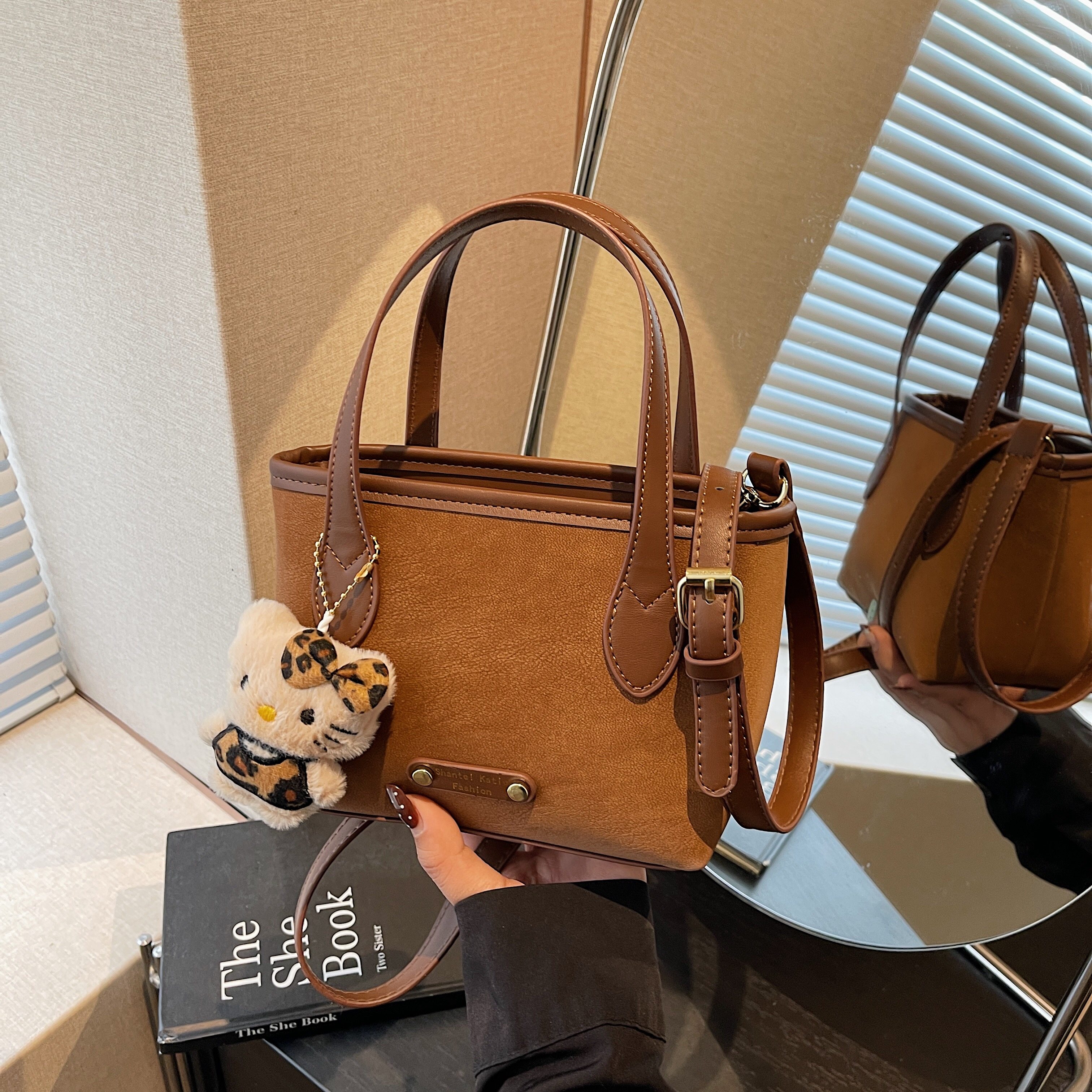 超火精致水桶包包女2026新款小众高级感复古迷你斜挎包上班小拎包,淘宝优惠券,粉丝福利购,淘宝优惠卷