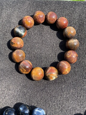 天然水晶进口纳米比亚彼得石红金猫眼手串手链送暴风雨宝石送朋友