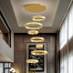 Large crystal chandelier in the middle floor of the modern minimalist living room